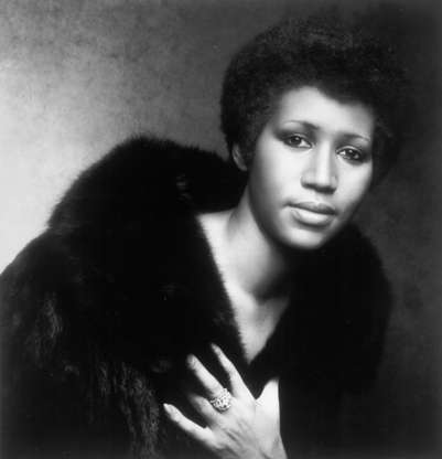 Slide 1 of 24: FEBRUARY 1974:  Soul singer Aretha Franklin poses for a portrait that appears on the album cover of her record 'Let Me In You Life' which was released in February 1974. (Photo by Michael Ochs Archives/Getty Images)